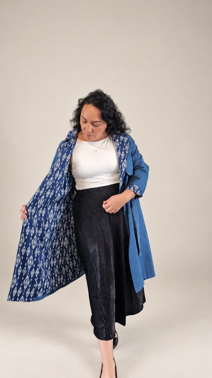 Demin trench coat with Māori design on lining 